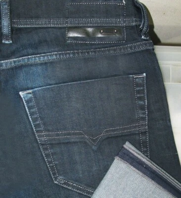 *LO ÚLTIMO AUTÉNTICO Pantalones de mezclilla para hombre DIESEL @ TEPPHAR 8W3 ajustados elásticos oscuros 32 x 34 Foto 1 de 4