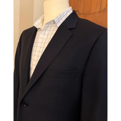 Blazer de lana azul marino Indochino para hombre 38S abrigo deportivo a medida chaqueta cirujanos puños Foto 1 de 4