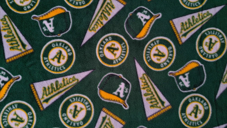 JOANN FABRIC Licensed Sports Team Fleece fabric by the yard Oakland A's - Image 1 of 1