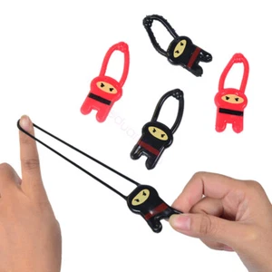 12 x STRETCHY NINJA SHOOT TOYS BOYS GIRLS FAVORS LOOT BIRTHDAY PARTY BAG FILLERS - Picture 1 of 5
