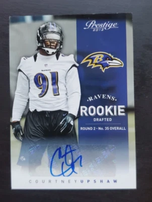 2012 Prestige Courtney Upshaw Rookie Auto 142/599 #219 Baltimore Ravens - Image 1 of 2