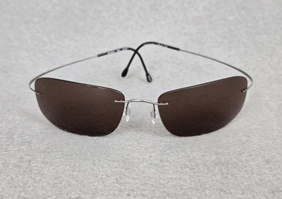 *RARE* Silhouette 8583 Silver Oval Rimless Titanium Lightweight Sport Shades - Image 1 of 4