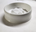 ceramic dog bowl with rising paw print by sweejar