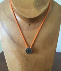 Hermes Palladium Cloud Saddle Pendant with 24 inch Braided Orange Cord Necklace - Picture 1 of 8