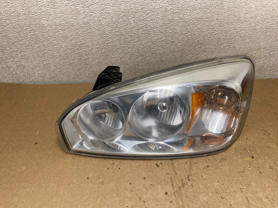 Faro izquierdo conductor Chevrolet Malibu 2004 a 2007 V0064 DW Foto 1 de 4