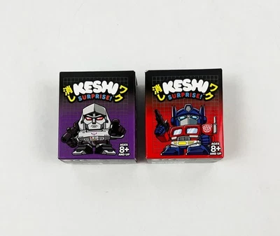 Super 7 Keshi Surprise Transformers Autobot and Decepticon Decoy - One of Each - Image 1 of 4