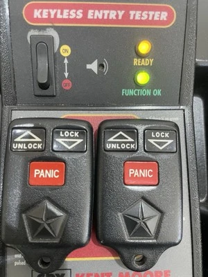 1996 1997 1998 LOTE DE 2 JEEP GRAND CHEROKEE 3 BOTONES CONTROL REMOTO GQ43VT7T Jeep OEM🟠 Foto 1 de 4