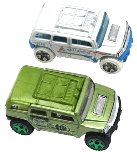 Hot Wheels Marvel Hulk Trucks Lot of 2 Hummer Rockster & Avalanche Unit Diecast - Picture 1 of 5