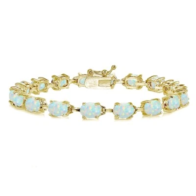 Gold Tone over Silver Simulated White Opal 7x5mm Oval Classic Tennis Bracelet - Image 1 of 3