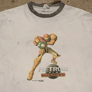 👾T-shirt promozionale vintage Metroid Prime Hunters Nintendo DS taglia L 21x25 - Foto 1 di 10