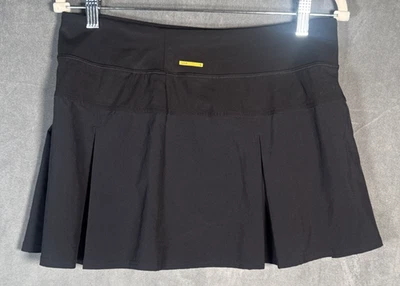 Falda corta plisada negra Lole Justine para mujer talla mediana Foto 1 de 4