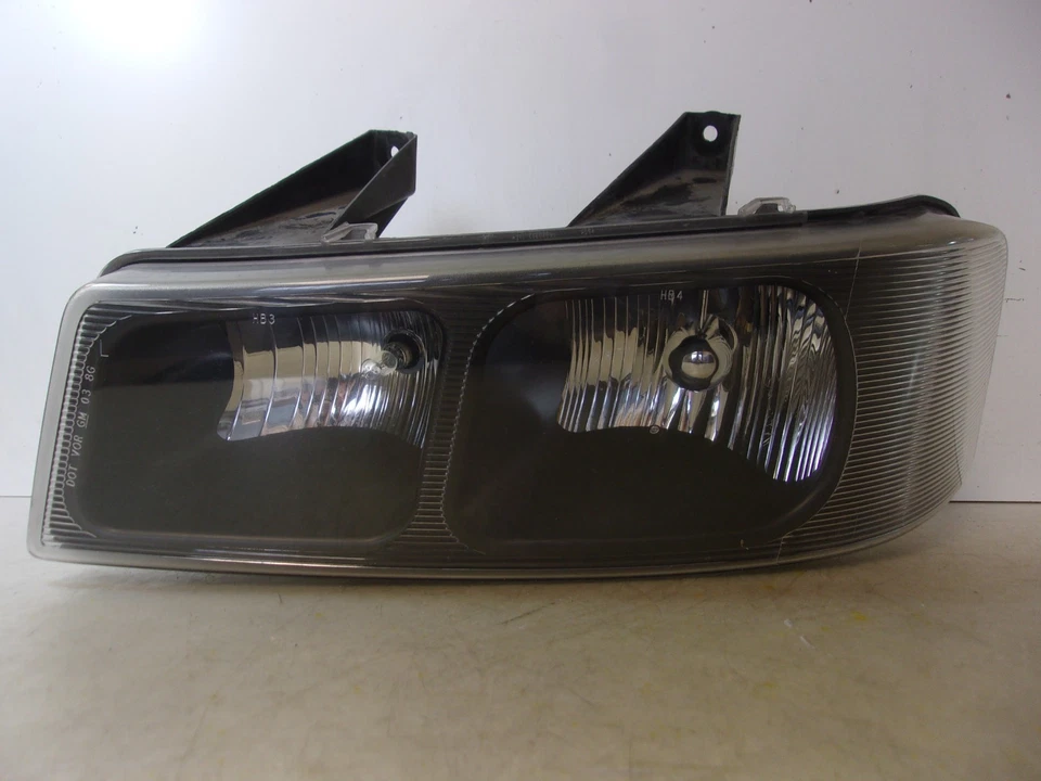 Faro compuesto halógeno LH Chevrolet Express/Savana Driver 2003-2023 OEM Foto 1 de 4