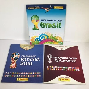 3 Panini FIFA World Cup Stickeralben 2014 2018 2022 leer - Bild 1 von 13