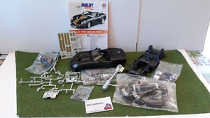 SHELBY SERIES 1 de 1999 cabriolet noir 1/18 kit à monter BURAGO 7023 incomplet - Picture 1 of 8