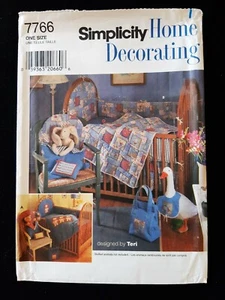 SIMPLICITY PATTERN - 7766 BABY NURSERY QUILT BUMPER PILLOW BIB NAPPY BAG UNCUT - Picture 1 of 2