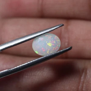 9x7 mm 1.1 Cts Natural Multi Flashy Fire Ethiopian White Opal Faceted Oval Shape - Picture 1 of 6