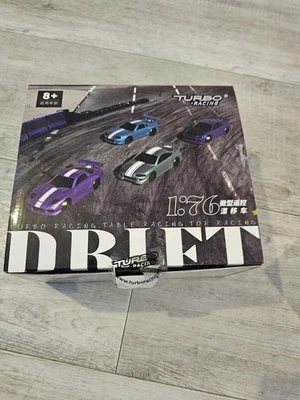 Turbo Racing 1:76 Scale Mini Remote R34 SKYLINE Control Drift RC Car with Gyro - Image 1 of 3