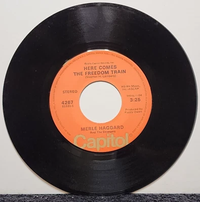 MERLE HAGGARD HERE COMES THE FREEDOM TRAIN/I WON'T GIVE UP MY TRAIN (NM) RECORD - Image 1 of 2