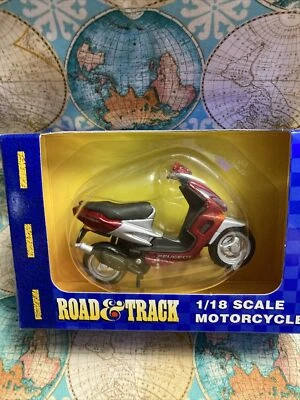 Maisto Road And Track 1/18 Scale Peugeot Motorcycle Red Silver - Image 1 of 4