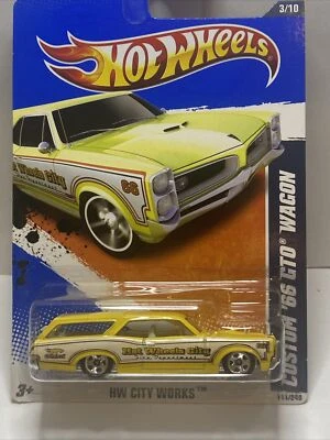 Hot Wheels #111 HW City Works 2010 3/10 personalizado '66 GTO WAGON amarillo en tarjeta 2011 Foto 1 de 4