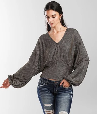 Top de mujer Red by BKE metálico dorado negro brillante manga larga talla mediana  Foto 1 de 4