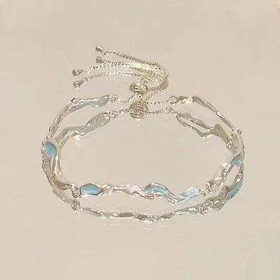 Bracciale di design in argento con design unico cuore cavo e gemme zirconi - Immagine 1 di 4