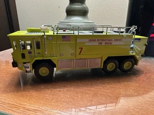 CODE 3 MASSPORT BOSTON LOGAN AIRPORT OSHKOSH CRASH FIRE TRUCK SCALE 1/64 LOOSE - Picture 1 of 4