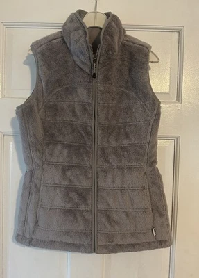 Chaleco acolchado reversible gris polar cremallera completa talla pequeña The North Face para mujer Foto 1 de 4