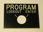 vintage embossed hard plastic tag PROGRAM LOCKOUT ENTER switch knob cover 