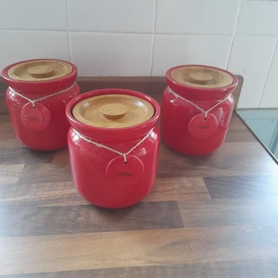Dunelm Hang Tag Tea Coffee Sugar Jars Red Ceramic Canisters With Wooden Lids - Image 1 of 4