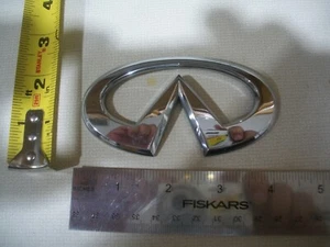 INFINITI M45 03 04 SYMBOL TRUNK LID EMBLEM LETTERS OEM USED - Picture 1 of 1