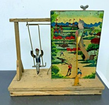 Meiji Era pre-war Japanese tin & wooden wind-up swing circus / baseball antique 