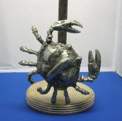 Toallero de papel de madera y metal tono plateado cangrejo pastel de barro Foto 1 de 4