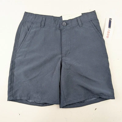 Pantalones cortos chinos de rendimiento azul marino IZOD para niños Foto 1 de 4
