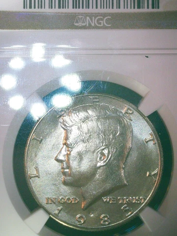 1985-P  Kennedy 50c NGC MS66 Virtually SPOT FREE VERY Lustrous Slightly PL Cover