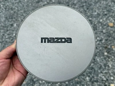 ОРИГИНАЛЬНЫЙ СЕРЕБРИСТЫЙ ЦЕНТРАЛЬНЫЙ КОЛПАК КОЛЕСА MAZDA 929 MPV 1988 1989 1990 1991 H268 37 190 - Изображение 1 из 2