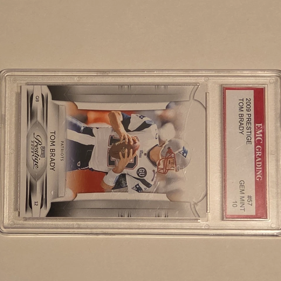 2009 Playoff Prestige #57 Tom Brady - Image 1 of 2