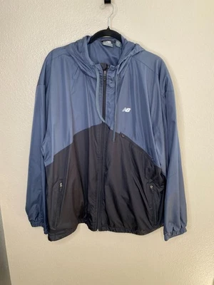 Chaqueta cortavientos ligera New Balance para hombre 2XL azul con capucha poliéster Foto 1 de 4