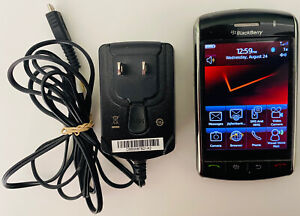Blackberry Storm Cell Phone W/ Charger **For Parts & Repair**