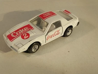 Pontiac Firebird 1986 transmisión automática Coca-Cola Team puertas turbo abiertas Hong Kong blanco Foto 1 de 4