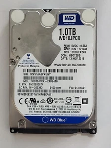 WD10JPCX-24UE4T0, DCM: HB0T2BB, 13 NOV 2016, Western Digital 1Tb 2.5" Sata HDD - Picture 1 of 2