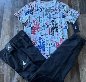 NWT Nike Air Jordan Boys YLG Black/White/Blue AllOver Print Wind Pants Set Large - Picture 1 of 5