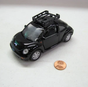 KINSMART ESCALA 1:32 NEGRO VOLKSWAGEN NUEVO ESCARABAJO DIECAST JUGUETE COCHE-PUERTAS ABIERTAS! - Imagen 1 de 5