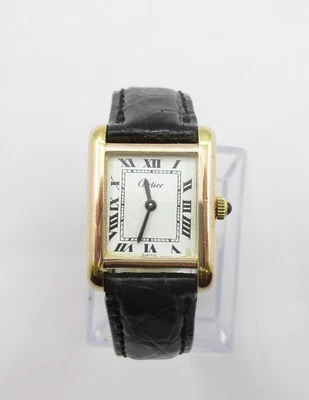 Reloj de pulsera suizo Cartier Tank años 80 cuerda manual enchapado en 18 quilates 21 mm x 28 mm Foto 1 de 4
