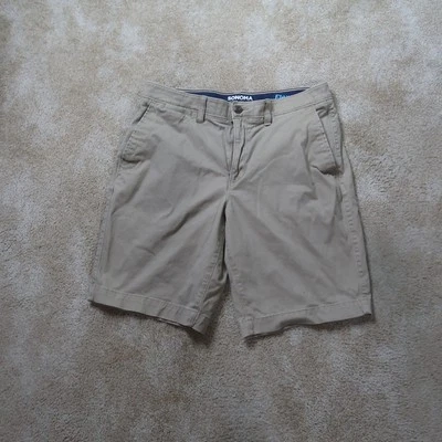 Pantalones cortos chinos clásicos Sonoma para hombre 34 beige frente plano ropa flexible Foto 1 de 4