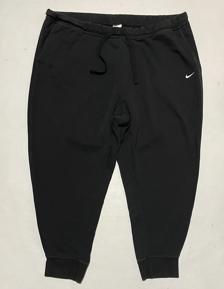 Pantalones deportivos Nike Joggers de vellón cónico para mujer 3X DB6080-010 negros Foto 1 de 4