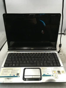 HP PAVILION DV2500 - FOR PARTS - INTEL CORE 2 DUO - 2GB RAM - 14" - READ -BB - Picture 1 of 7