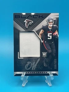 Parche de novato Panini Black 2022 automático Drake London #212/199 (RC) - Imagen 1 de 3