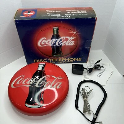 1995 Coca-Cola Coke Vintage Blinking Disc Telephone With Manual & Box  - Image 1 of 4