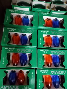 NOS 70+ Packs NOMA 4pc Per Pack Colored Replacement Outdoor Bulbs 7 Watt C9 1/4 - Picture 1 of 7
